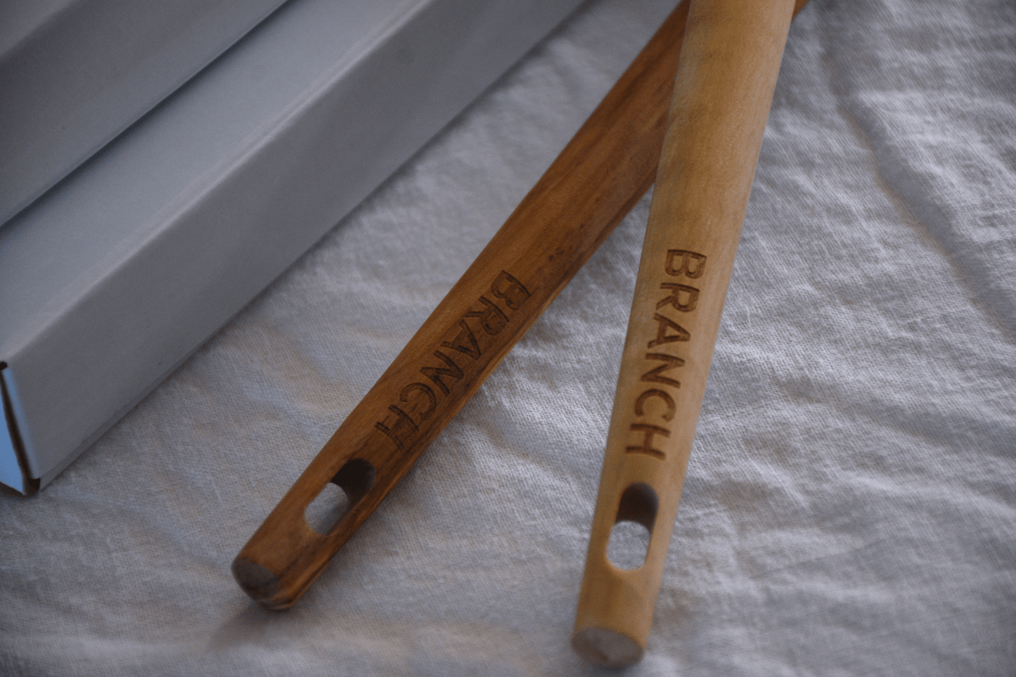 Branch branding on wooden utensil handle